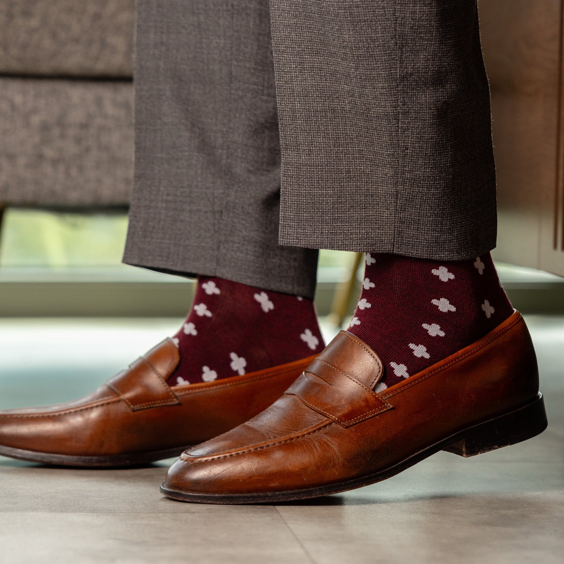 a deep red sock with a white hatch pattern