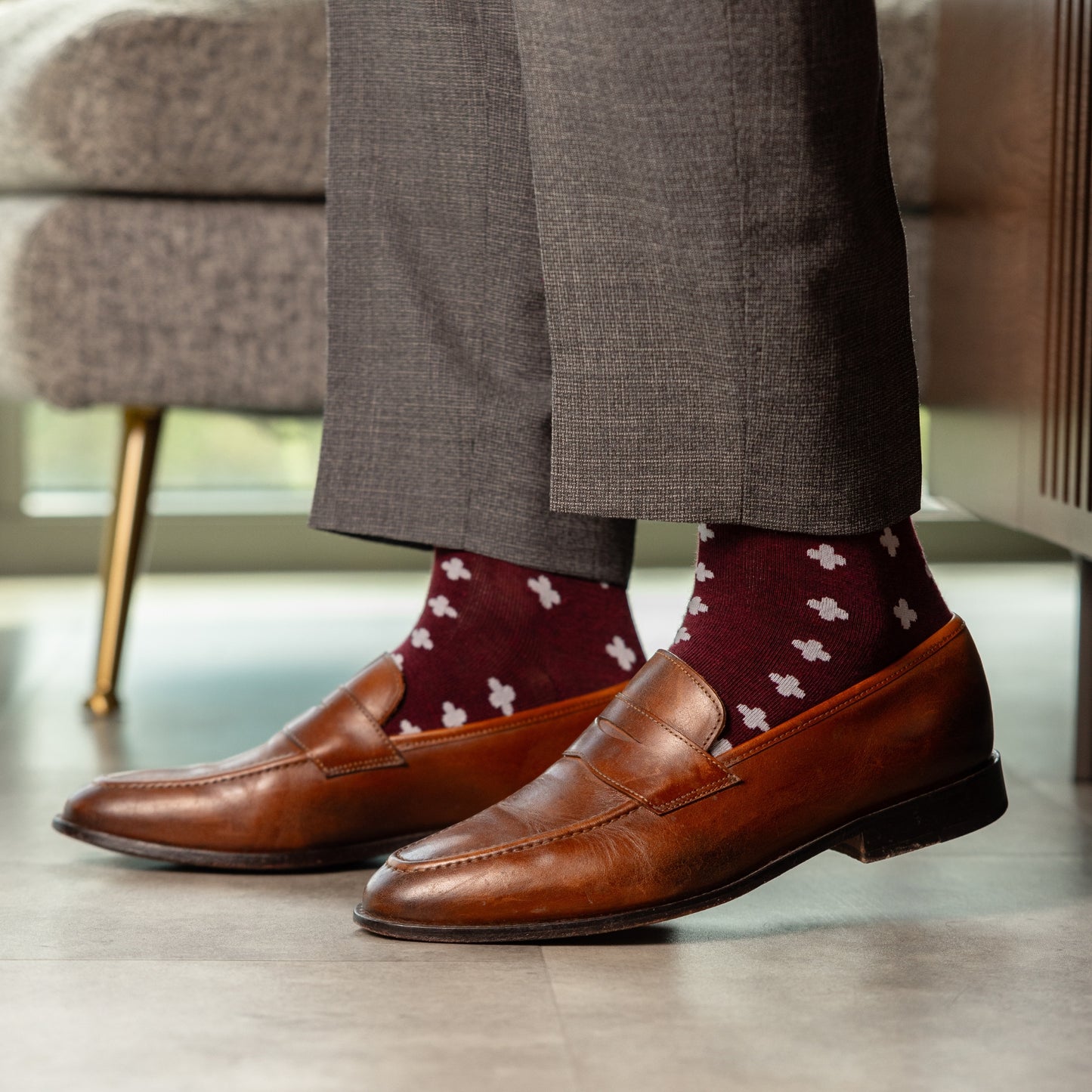 a deep red sock with a white hatch pattern