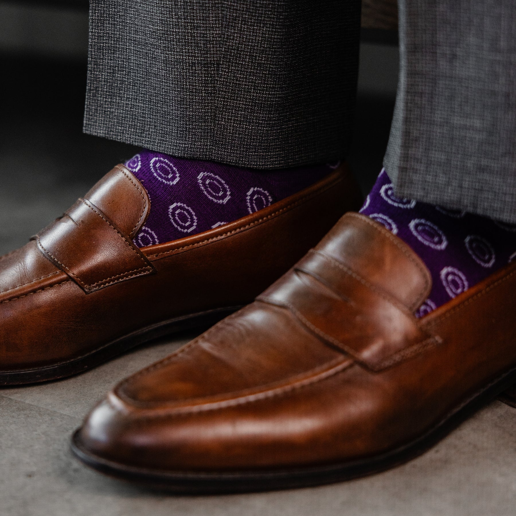 a deep purple men's dress sock with a white double dot pattern