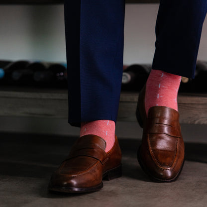 coral men's dress socks with a light blue t-sun pattern