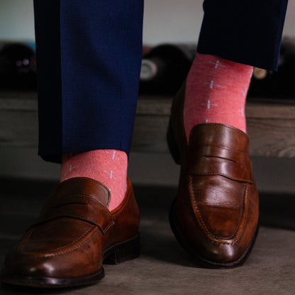 coral men's dress socks with a light blue t-sun pattern