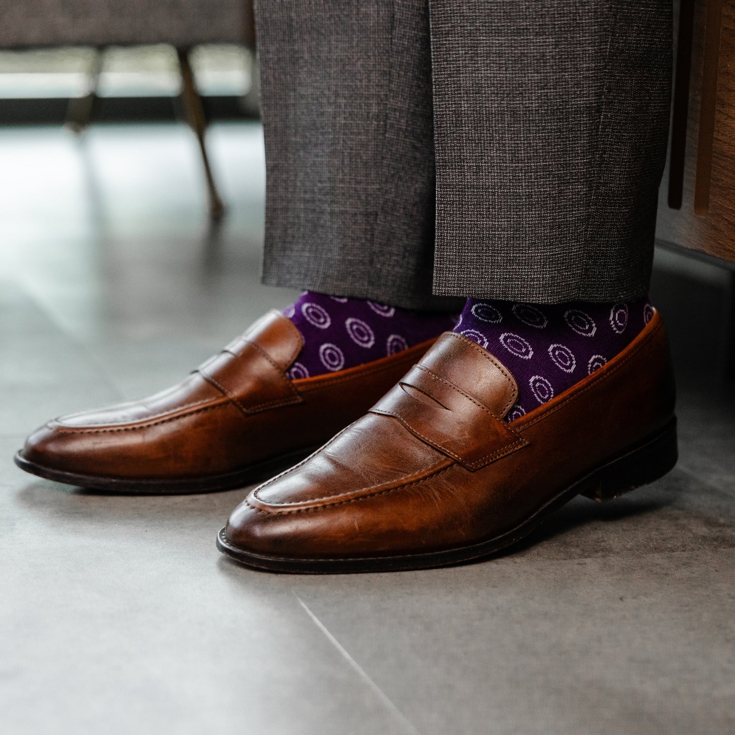 a deep purple men's dress sock with a white double dot pattern