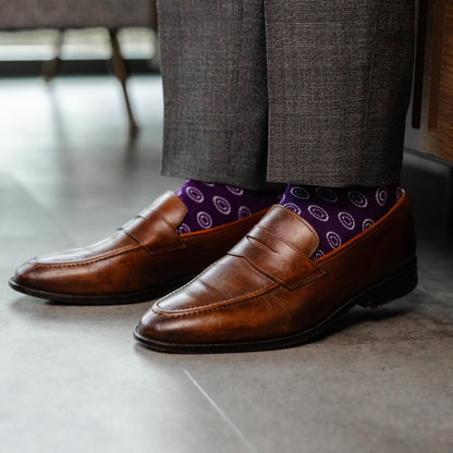 a deep purple men's dress sock with a white double dot pattern