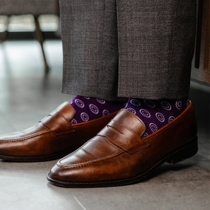 a deep purple men's dress sock with a white double dot pattern