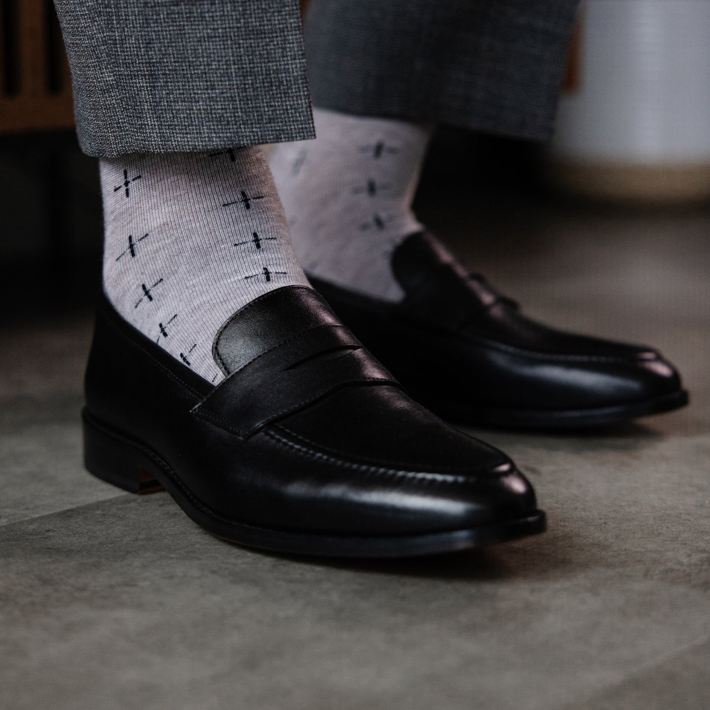 Grey men's dress socks with a black T-Sun pattern