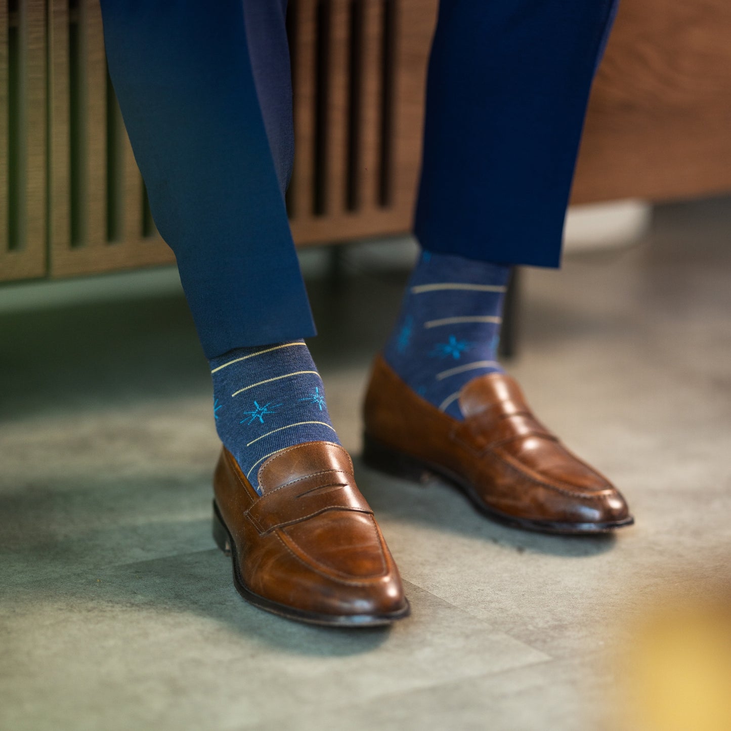 Prussian Blue men's dress socks with sky blue and gold constellation and stripe patterns.