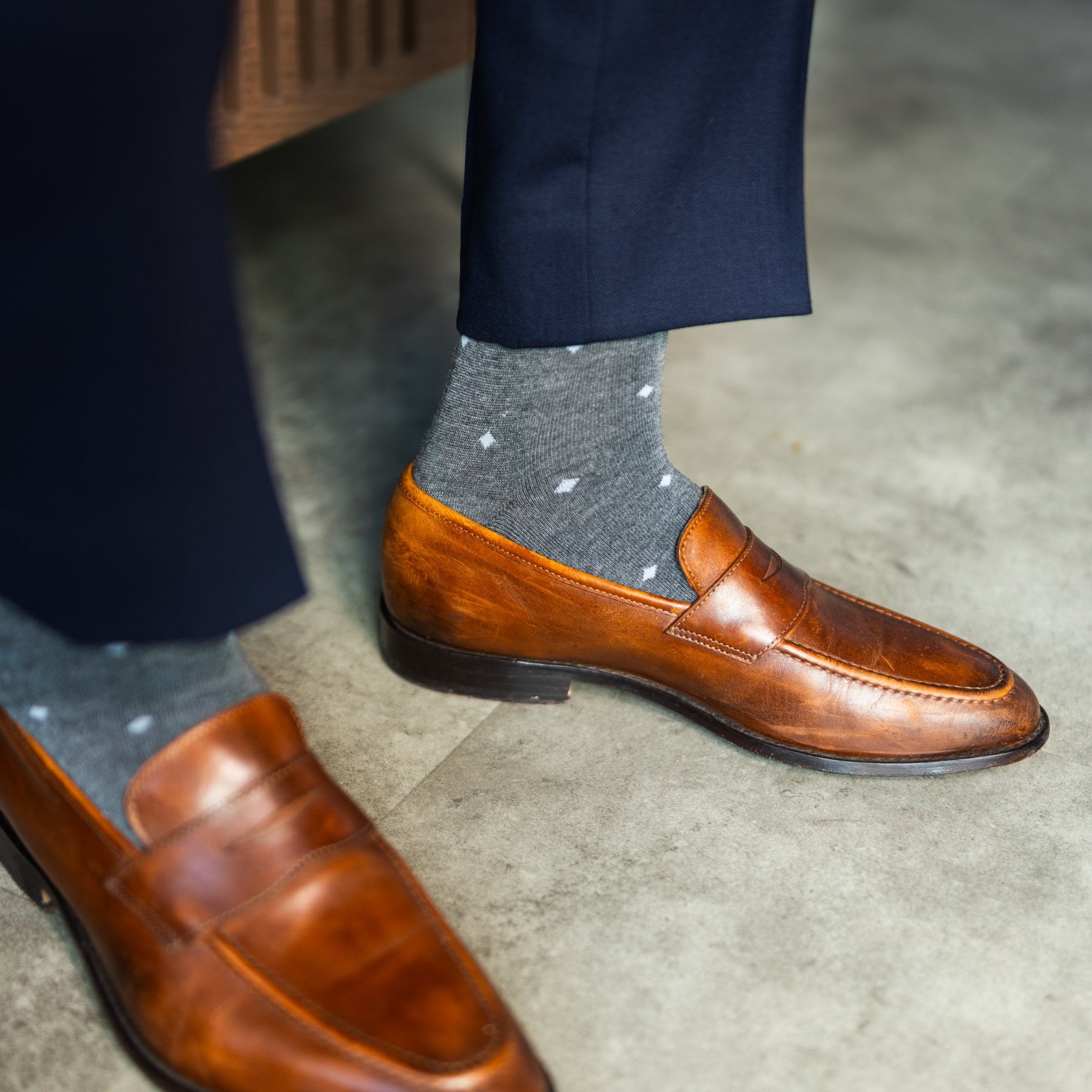 grey men's dress socks with a pale blue diamond pattern