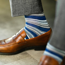 Blue and tan multi-stripe patterned men's dress socks