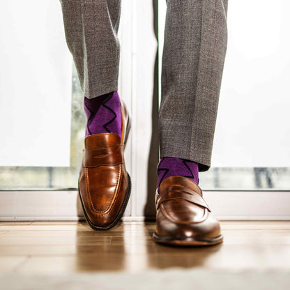 Plum purple men's dress socks with a black zigzag pattern