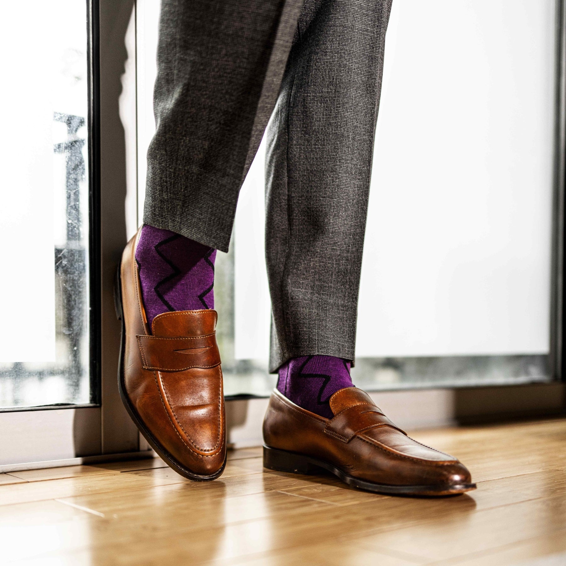 Plum purple men's dress socks with a black zigzag pattern