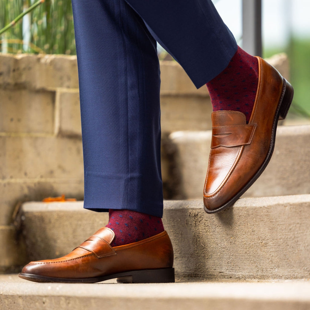 deep red men's dress sock with navy blue polkadots