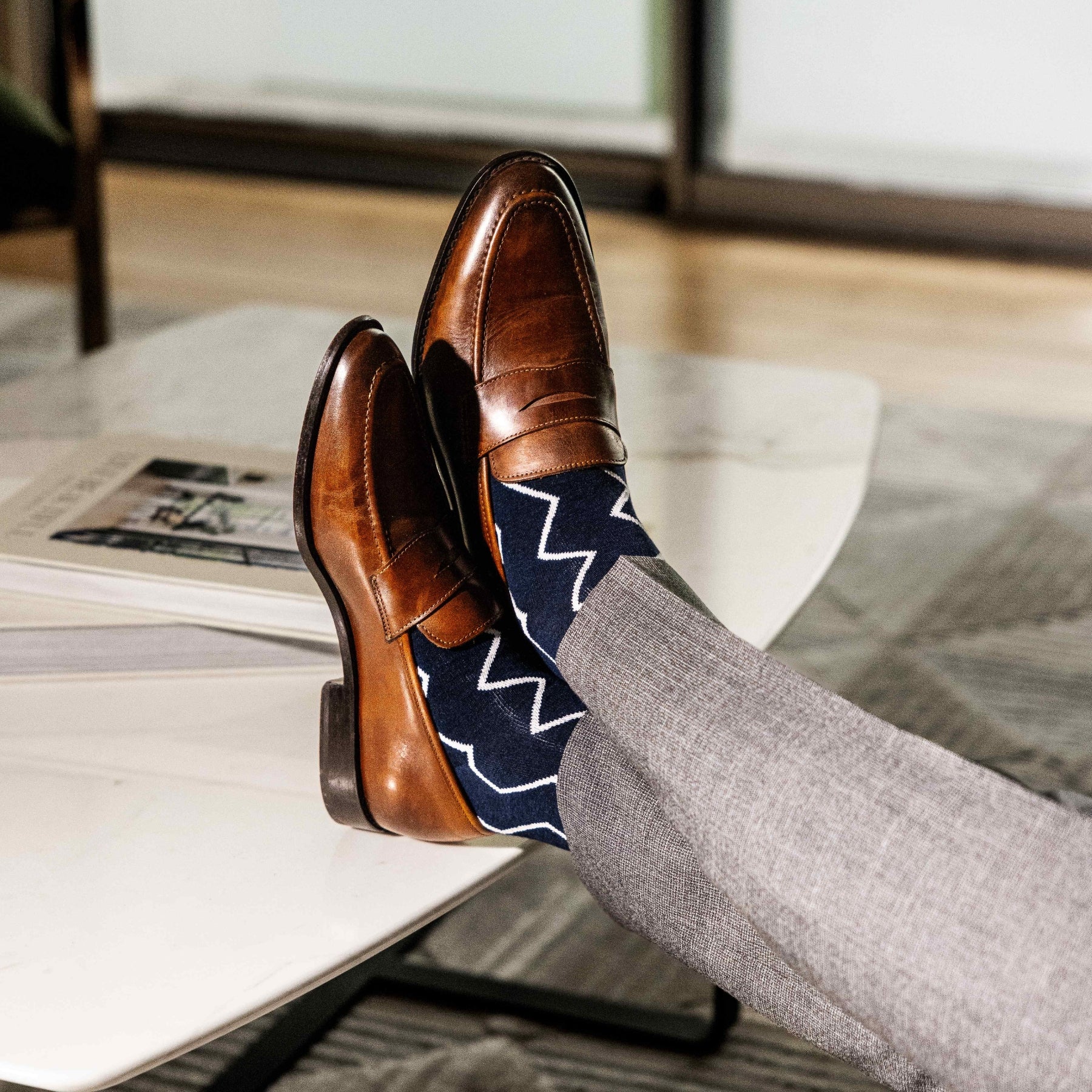 navy blue socks with a white zigzag pattern