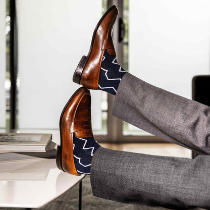 navy blue socks with a white zigzag pattern