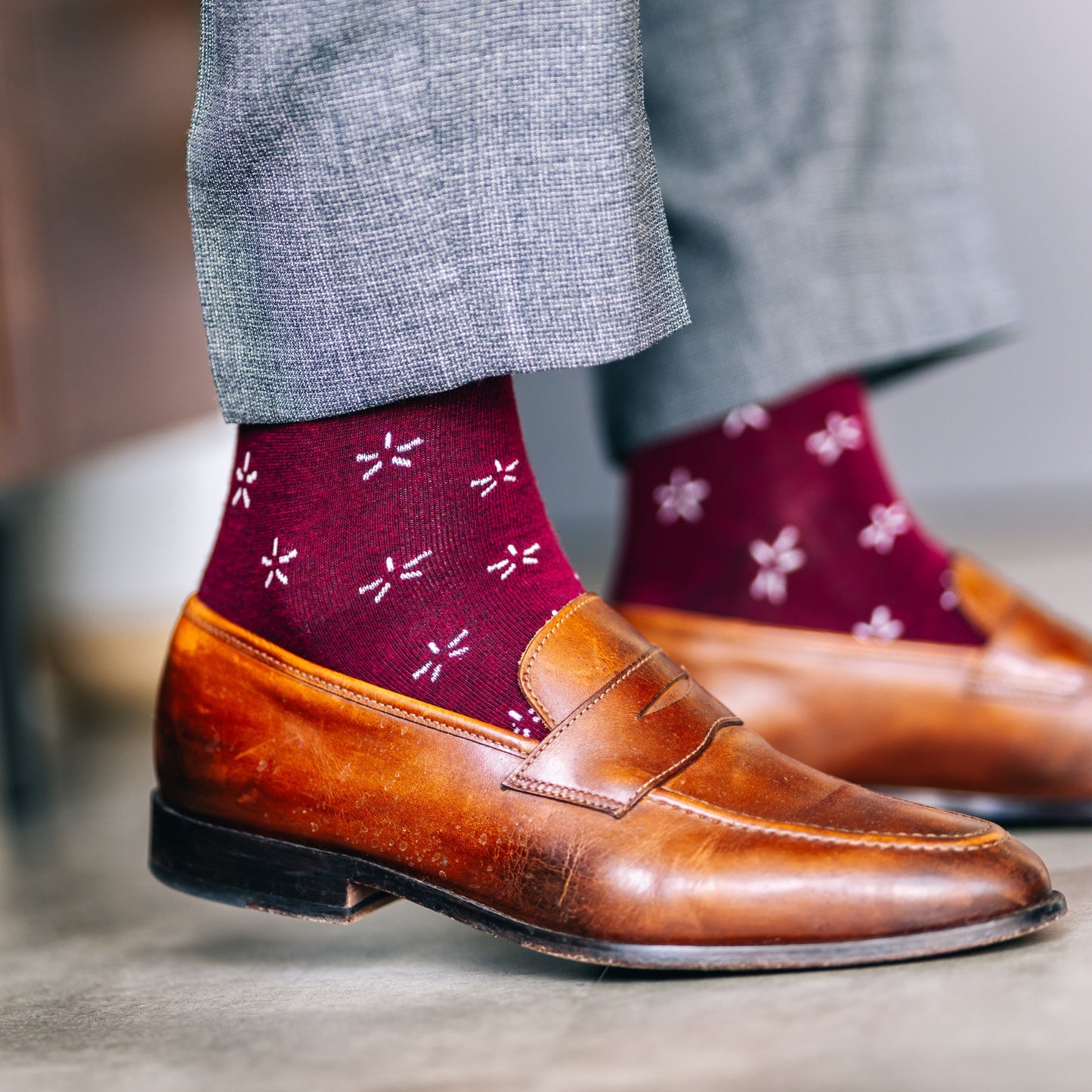 Deep red sock with a contrasting white firework pattern