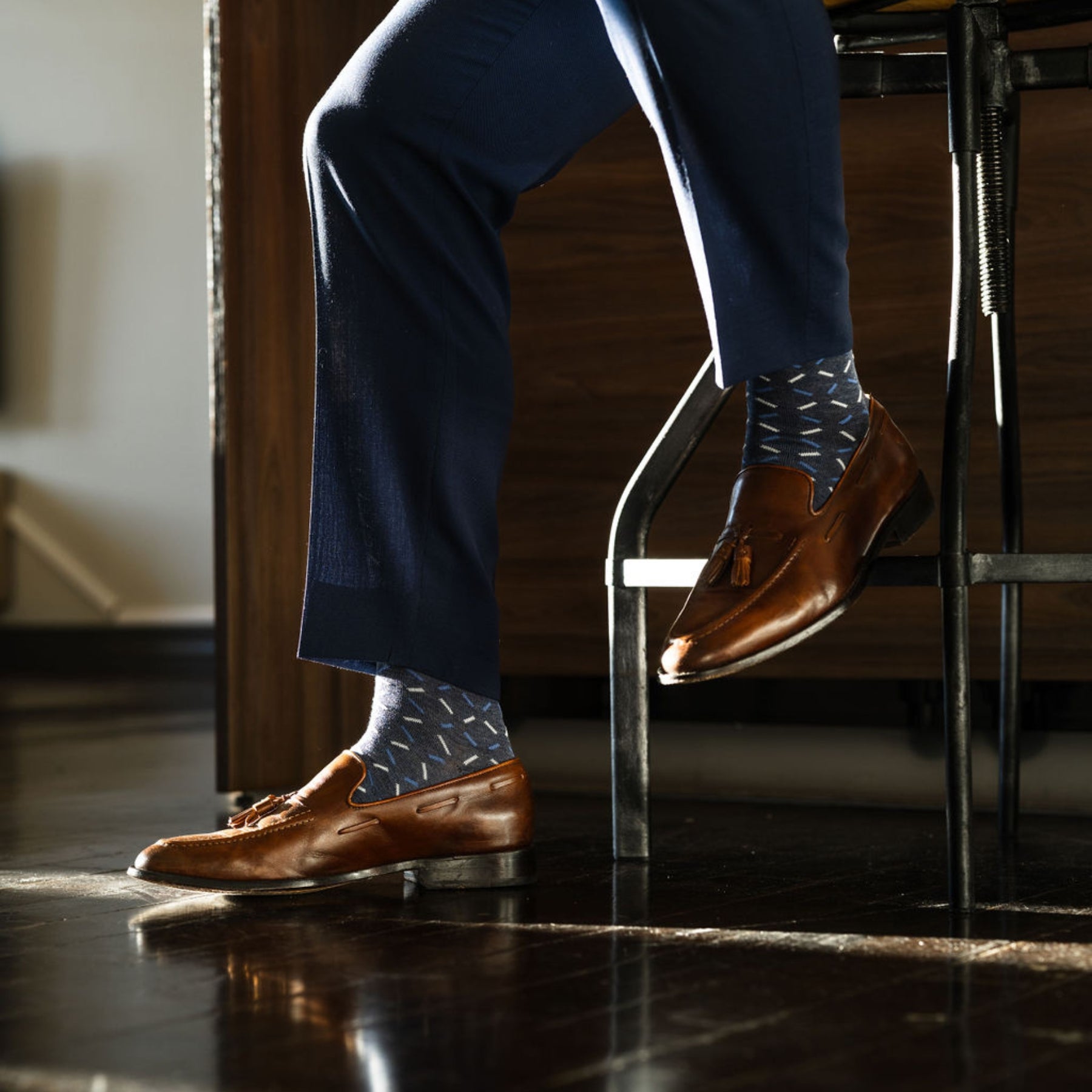 dark blue men's dress socks with light blue and white x pattern