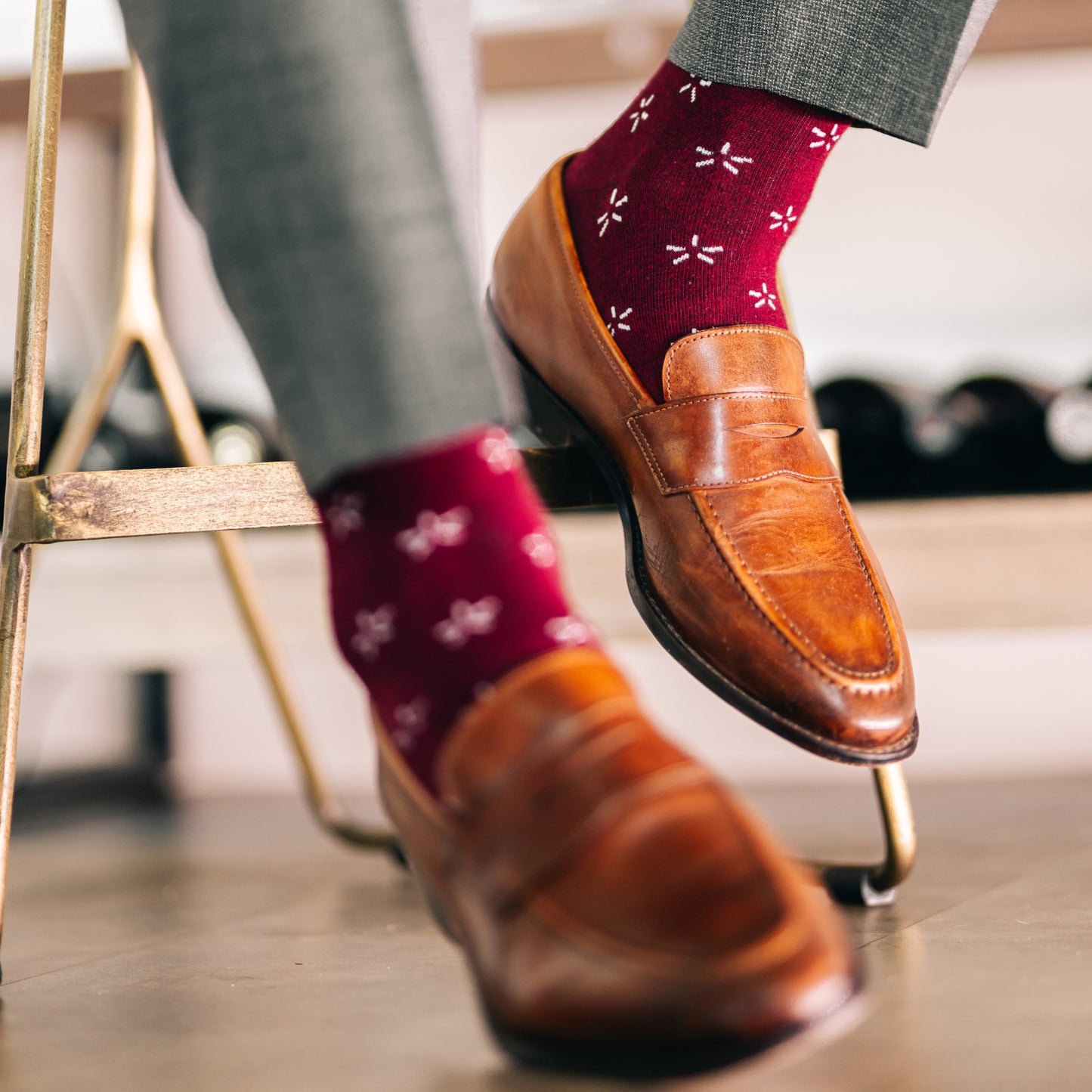 Deep red sock with a contrasting white firework pattern