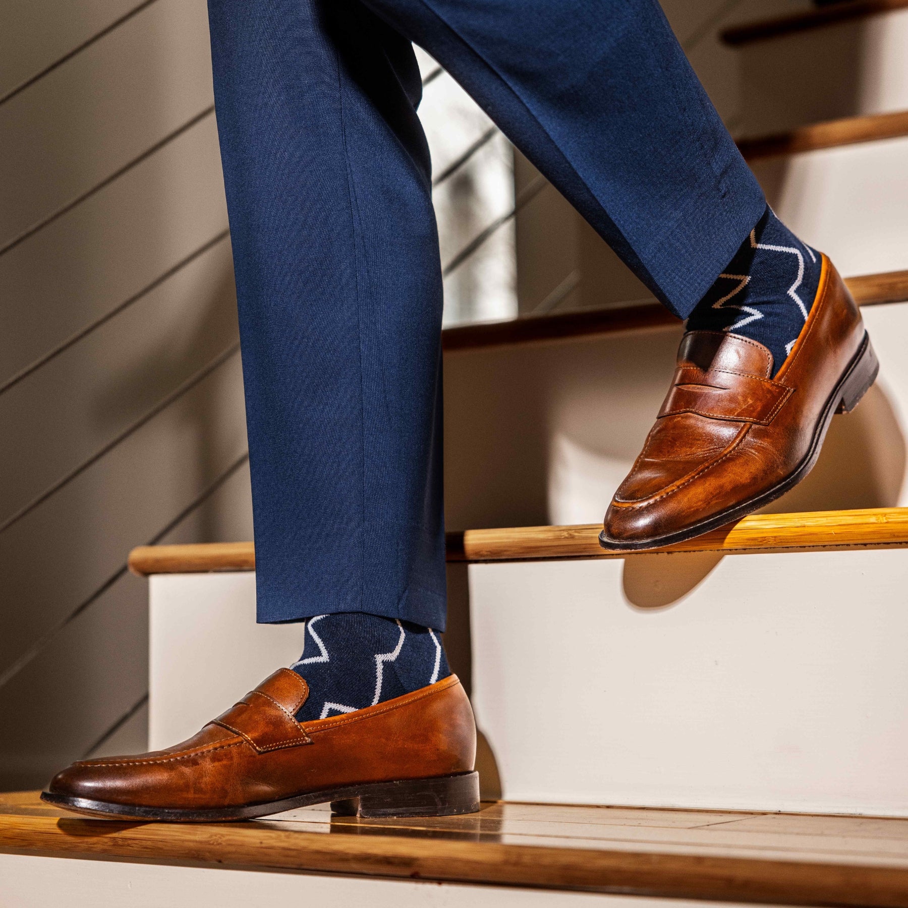 navy blue socks with a white zigzag pattern