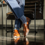 dark blue men's dress socks with light blue and white x pattern
