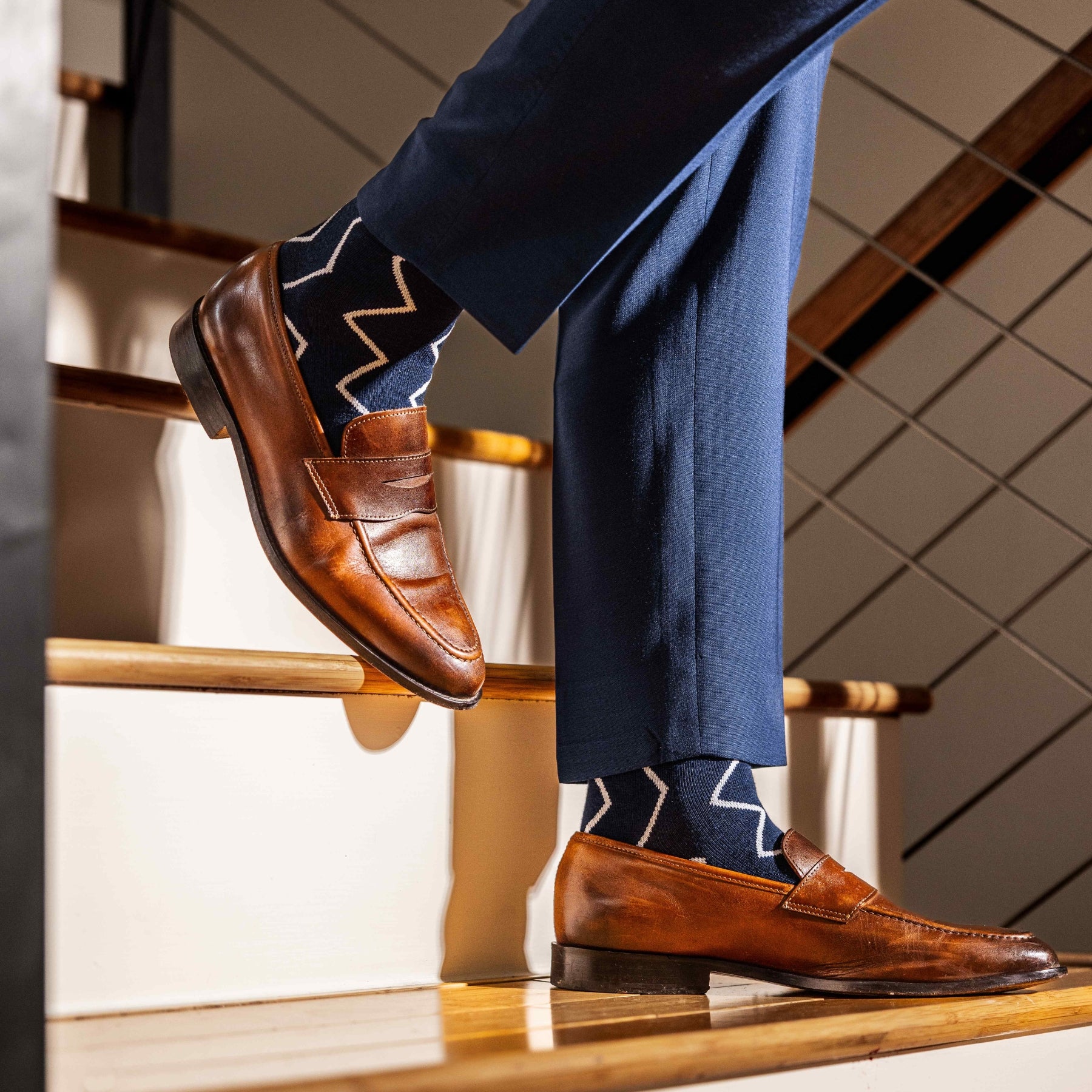 navy blue socks with a white zigzag pattern