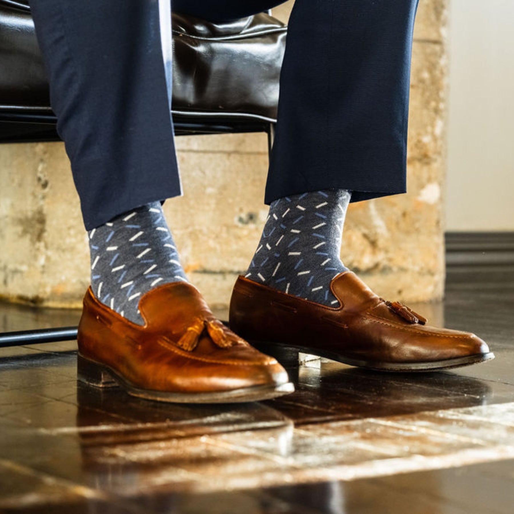 dark blue men's dress socks with light blue and white x pattern