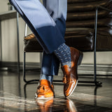 dark blue men's dress socks with light blue and white x pattern