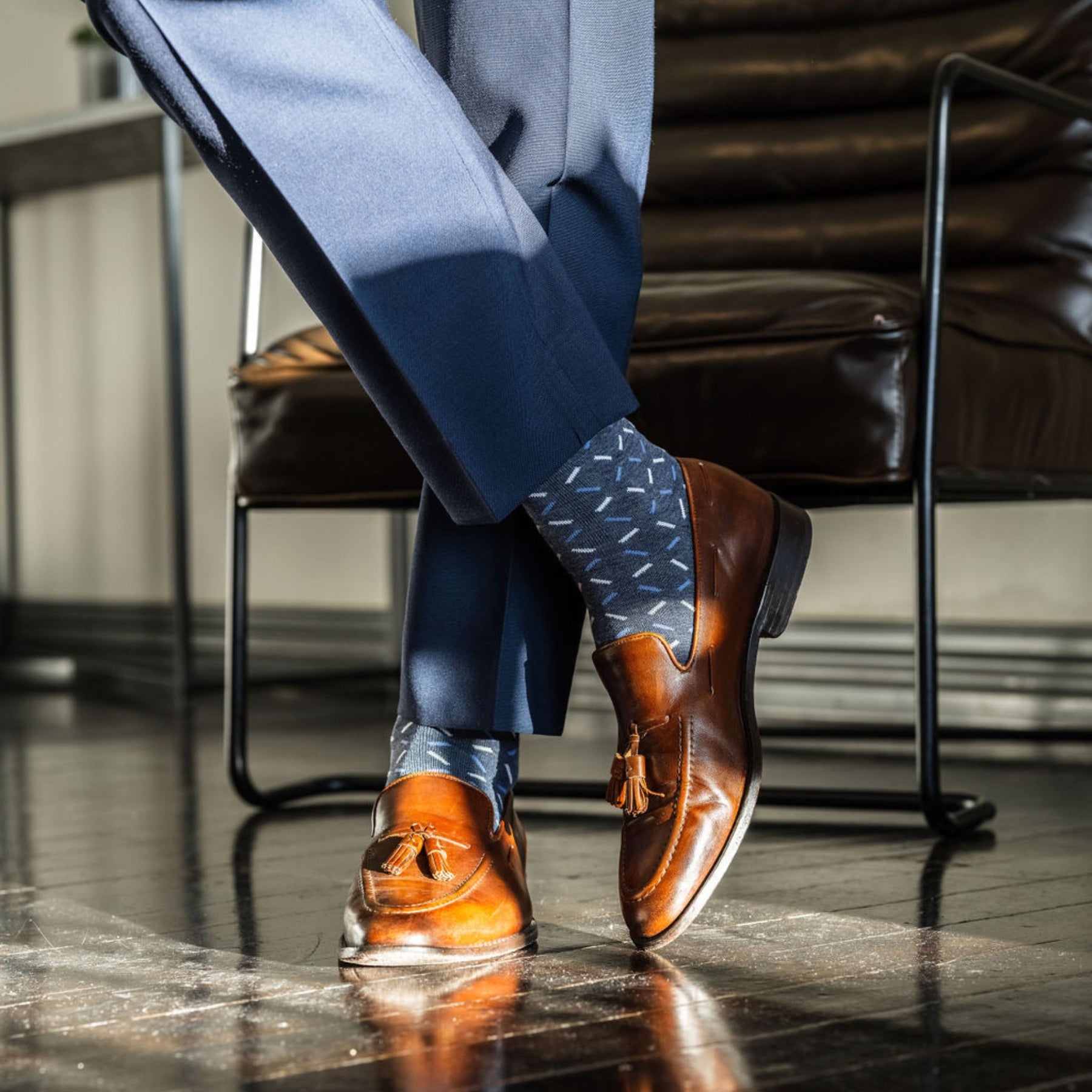 dark blue men's dress socks with light blue and white x pattern
