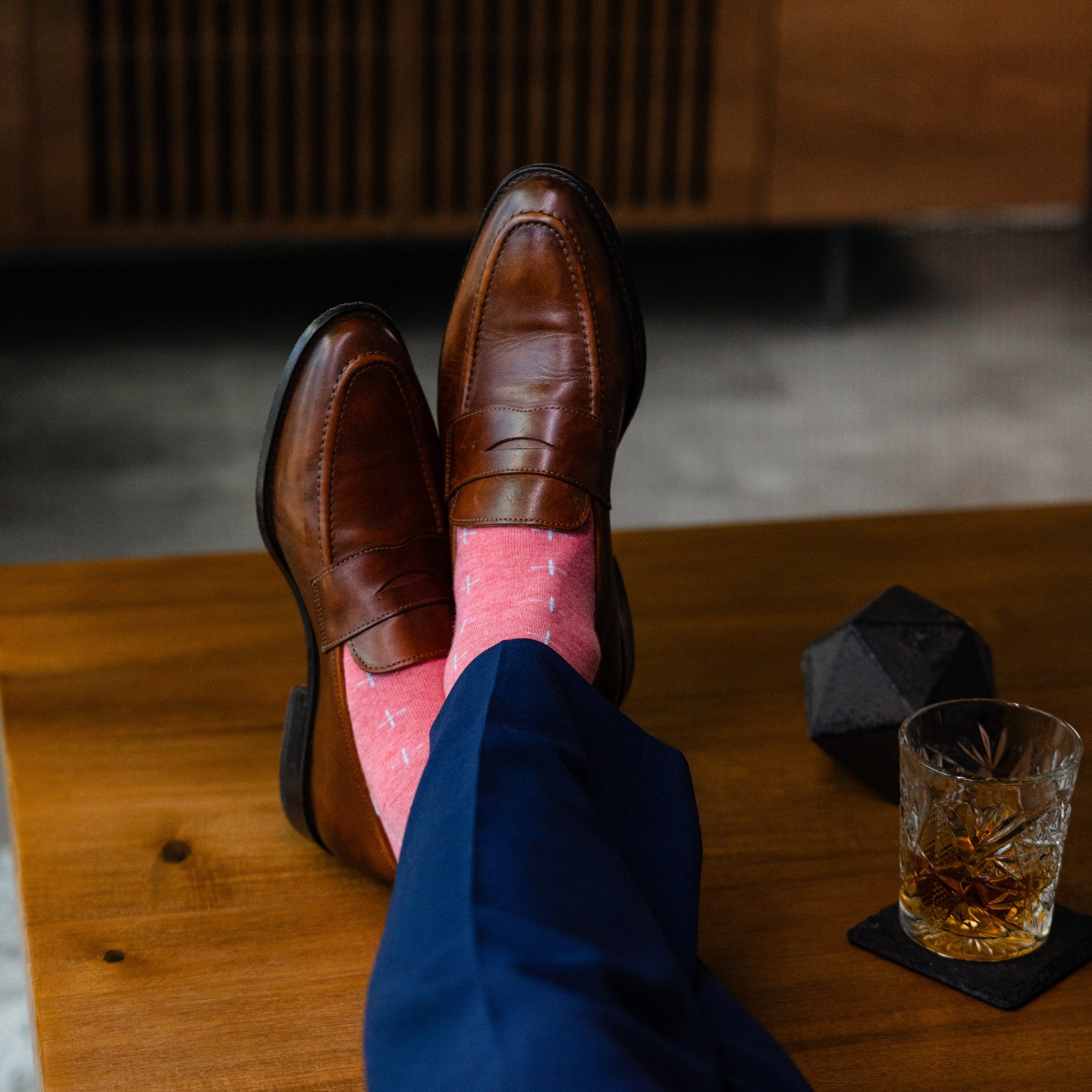 coral men's dress socks with a light blue t-sun pattern