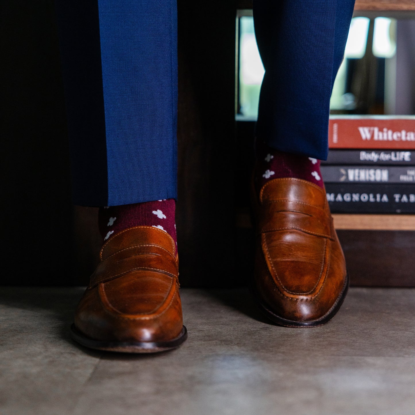 a deep red sock with a white hatch pattern