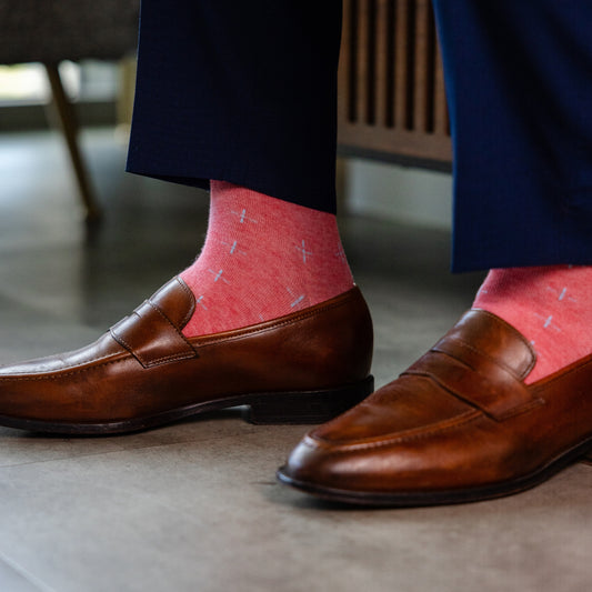 coral men's dress socks with a light blue t-sun pattern