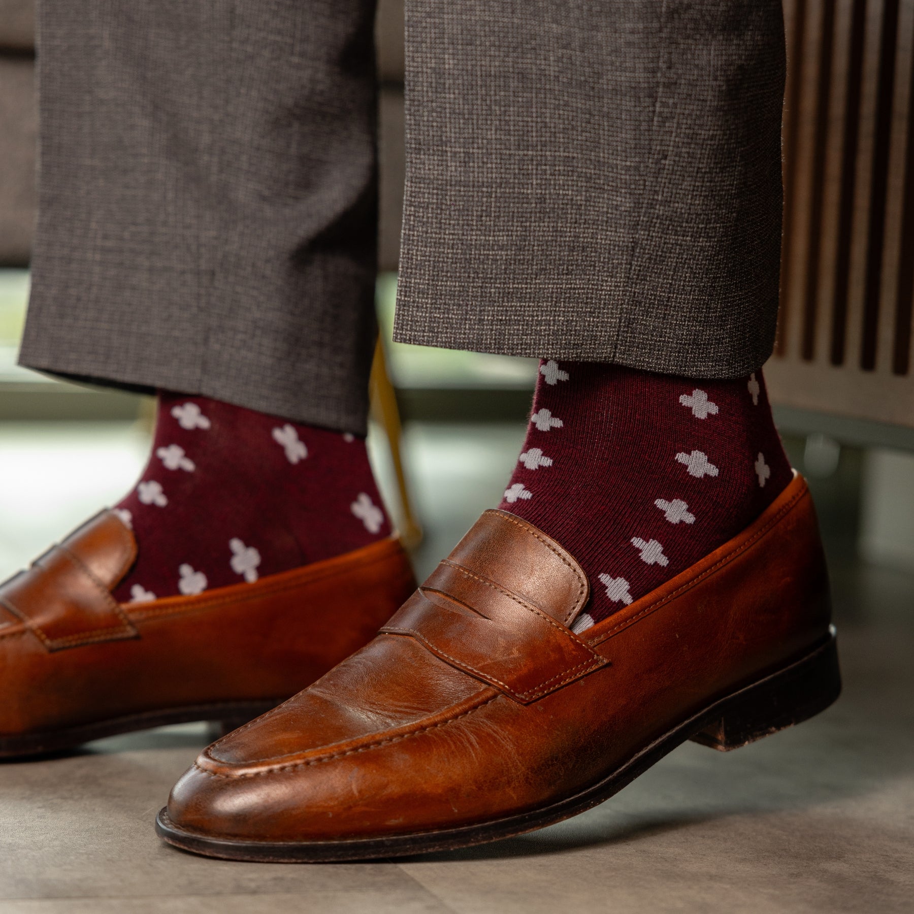 a deep red sock with a white hatch pattern