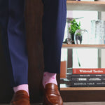 Heathered pink men's dress socks with a fuchsia flower pattern