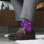 Purple men's dress sock with a white flower pattern