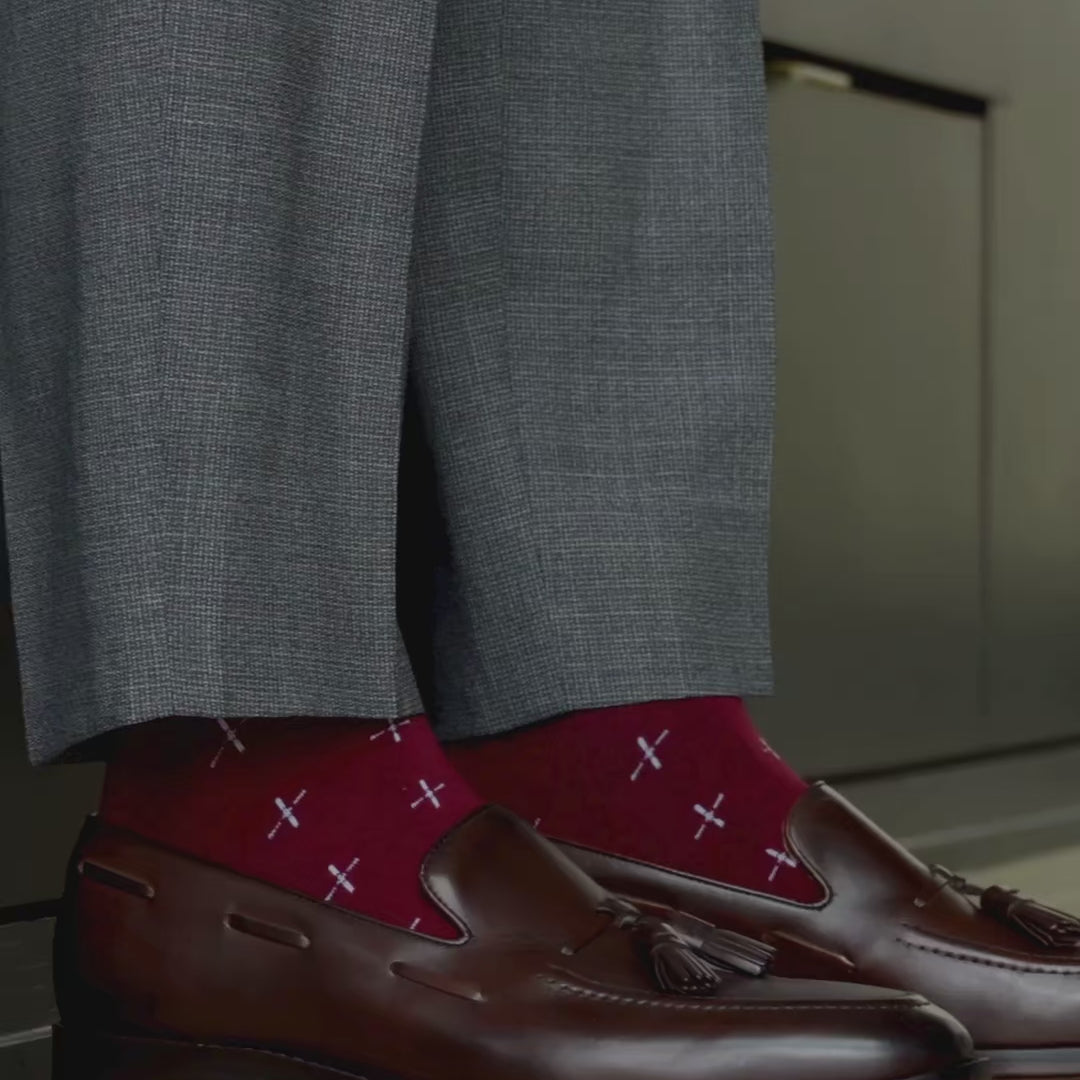 Merlot colored deep red socks with white t-sun pattern