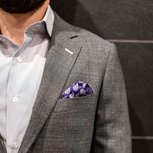 purple paisley pocket square with grey suit and striped shirt