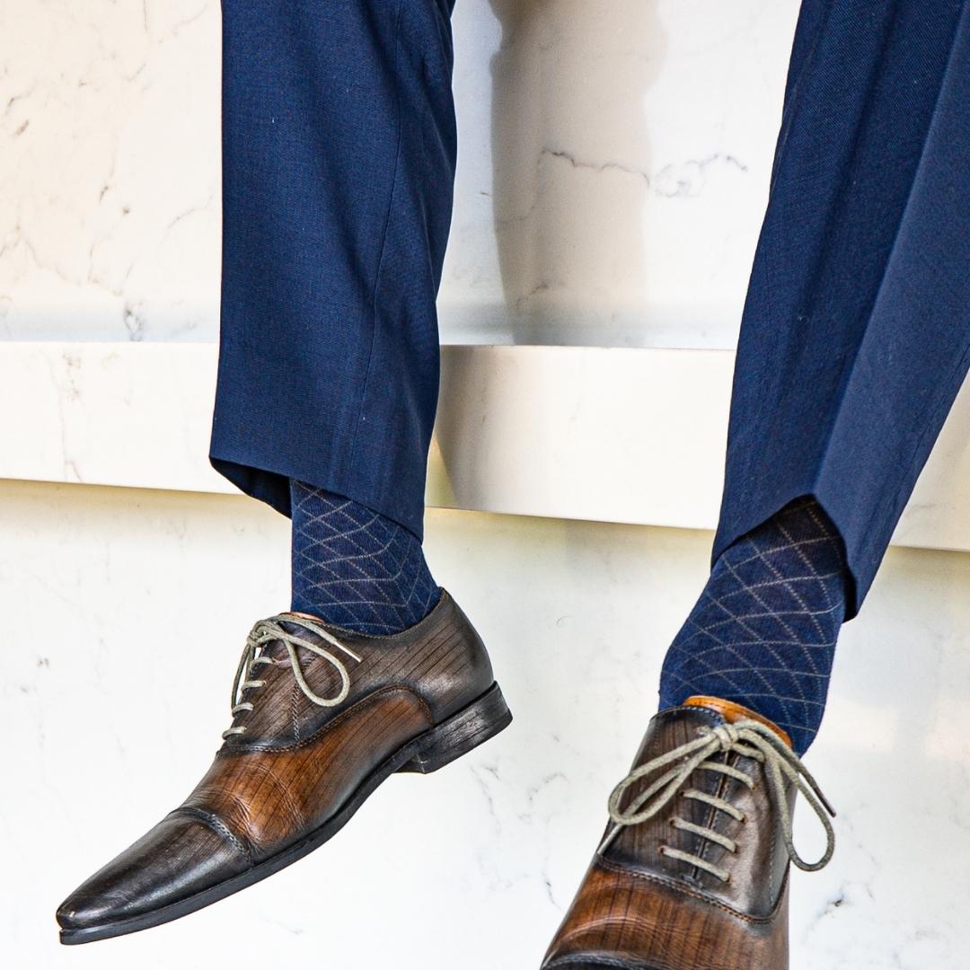 deep blue men's dress sock with contrasting diamond pattern
