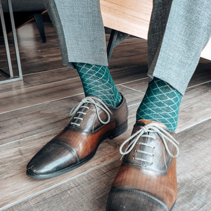 Deep green men's dress sock with contrasting diamond pattern
