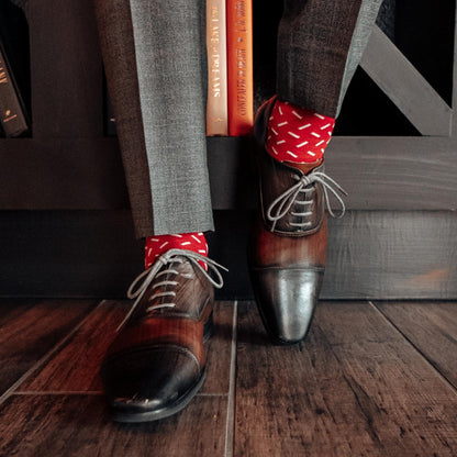 Raspberry red men's dress sock with white sprinkles pattern