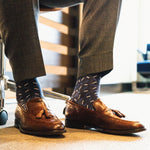 dark blue men's dress socks with light blue and white x pattern