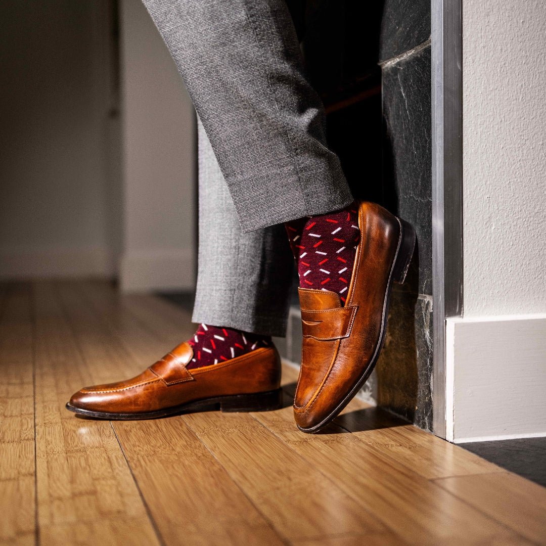 deep red men's dress sock with red and white x pattern