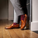 deep red men's dress sock with red and white x pattern