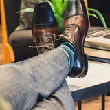 Green, white, and black striped men's dress sock