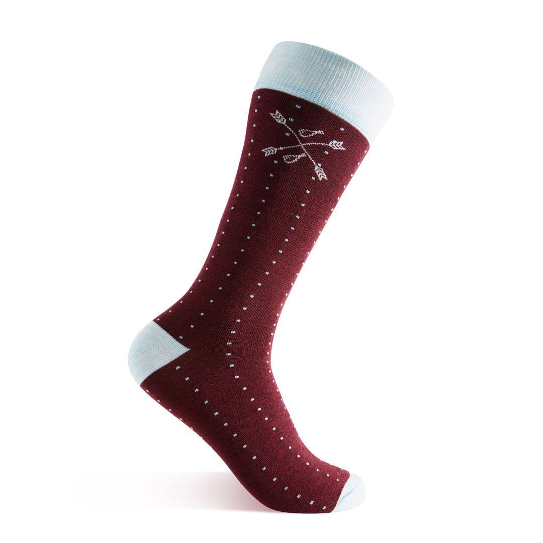 Deep red sock with light blue pin dot pattern