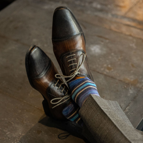 The Harolds - A Blue and Tan Striped Sock