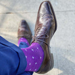 Man wearing purple dress socks and brown dress shoes