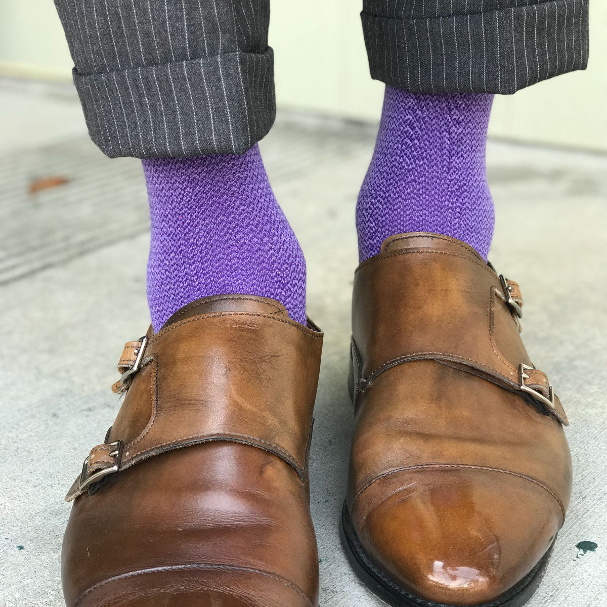 man wearing purple business socks