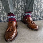 red, white, and blue multi-stripe patterned men's dress socks