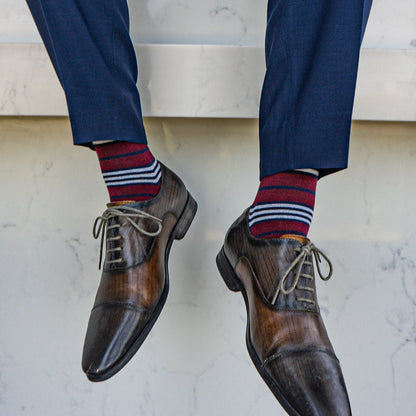red, white, and blue multi-stripe patterned men's dress socks