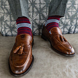 red, white, and blue multi-stripe patterned men's dress socks