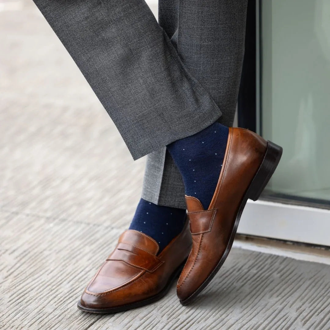 Gray suit trousers with brown penny loafers and The Oxford Blues sock from the Blue Bundle