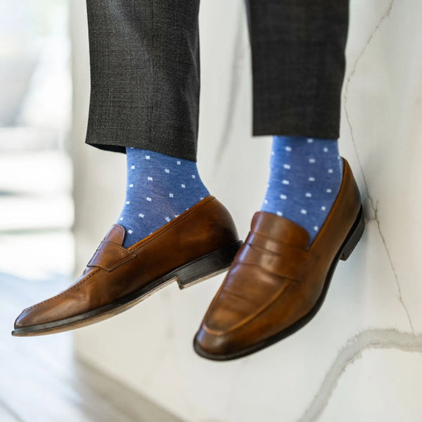 The Braxtons, a heathered blue sock with ocean-blue micro-squares